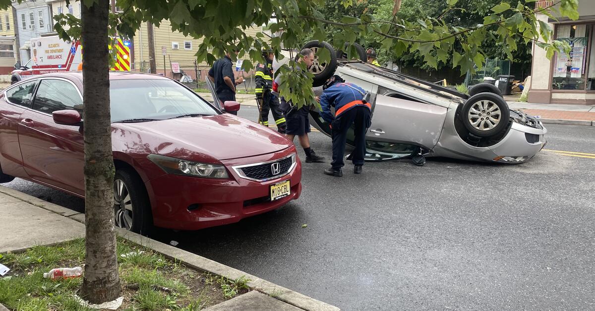 Car Crash Overturns Vehicle on Street in Elizabeth