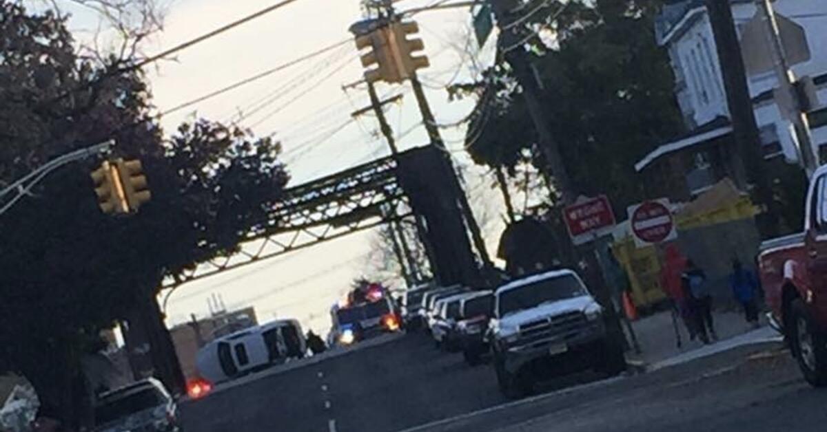 Elizabeth Crash Leaves Vehicle on Its Side; At Least One Injured