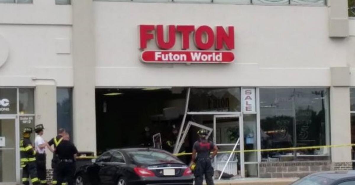 Car Crashes into Woodbridge Business, Injuring One
